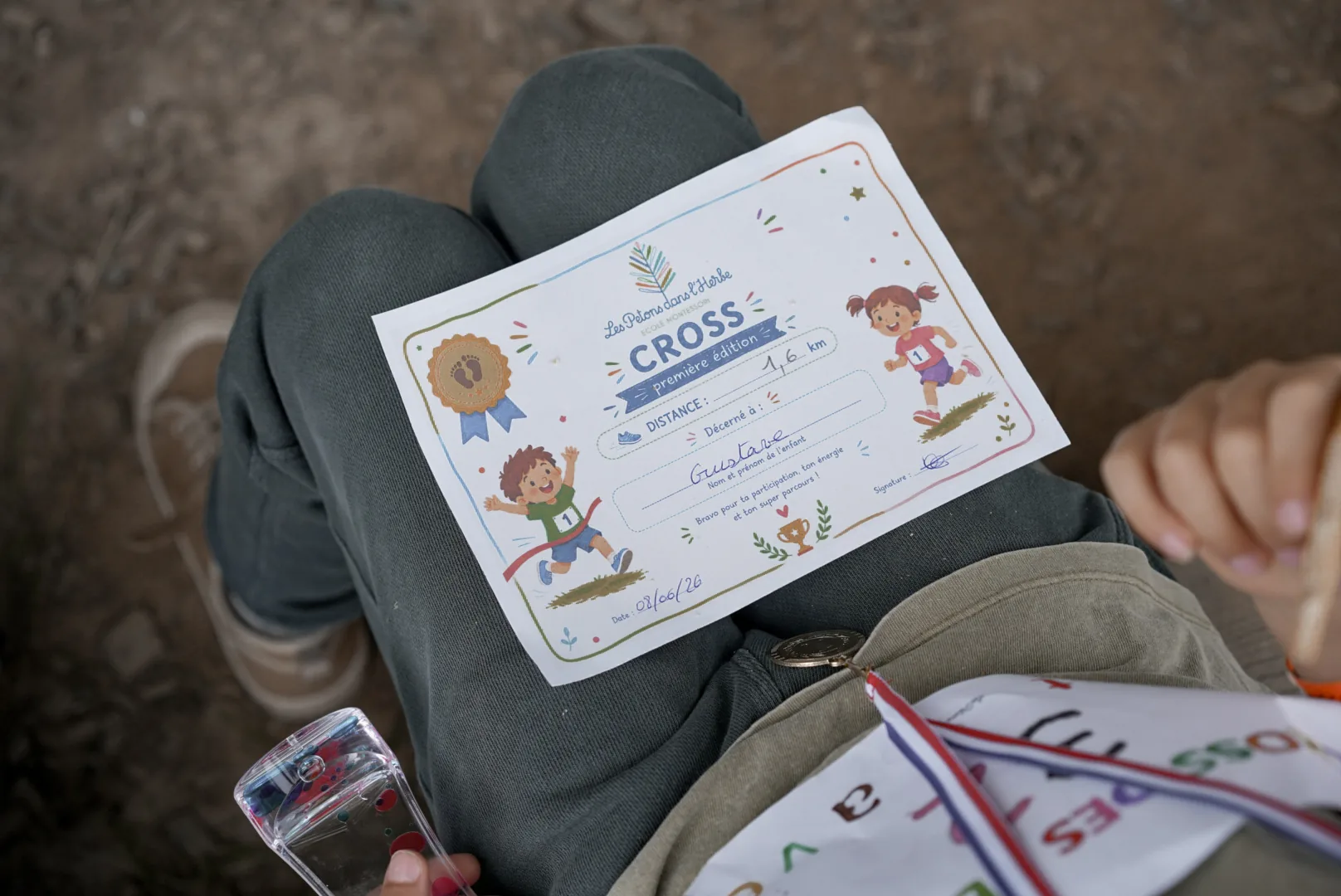 Le diplôme remis à un enfant pour célébrer sa participation au cross.
